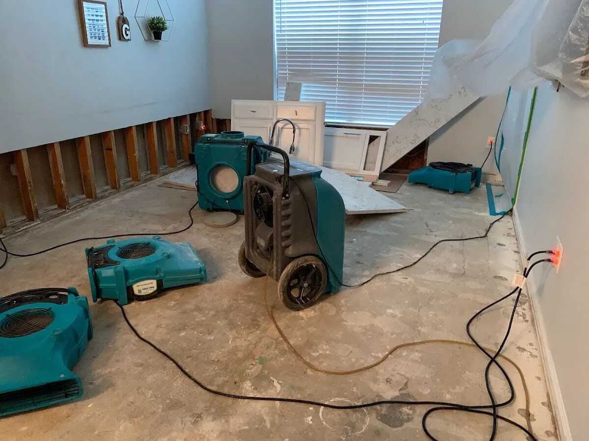 Dehumidifier in flood-cut room for Water Damage Restoration in Fircrest